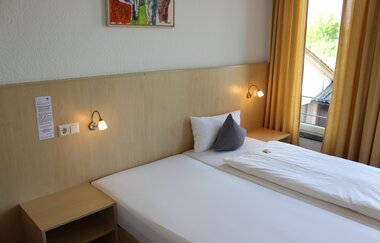 Doppelbett | © Gästehaus zum Wolffenturm